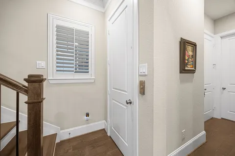 a view of a hallway with windows