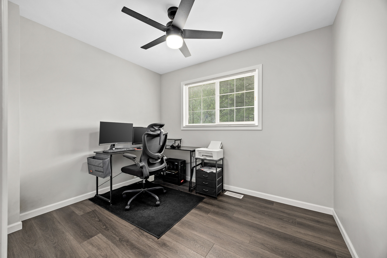 148 Bedford Road Bolingbrook, IL 60440 - Photo 21 of 32 a view of a workspace with wooden floor and a window
