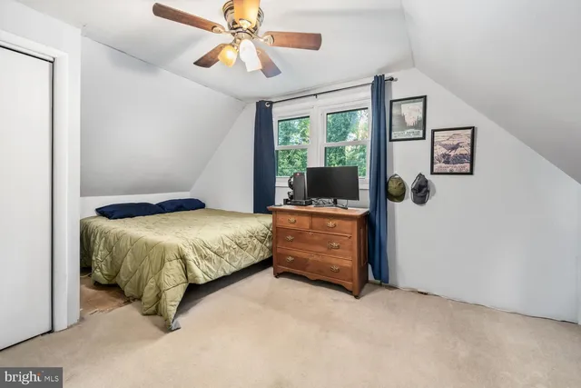 a bathroom with a sink toilet and mirror