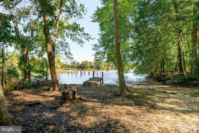 a view of a lake with a outdoor space