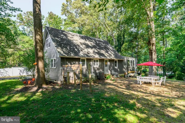 an outdoor space with patio and barbeque oven