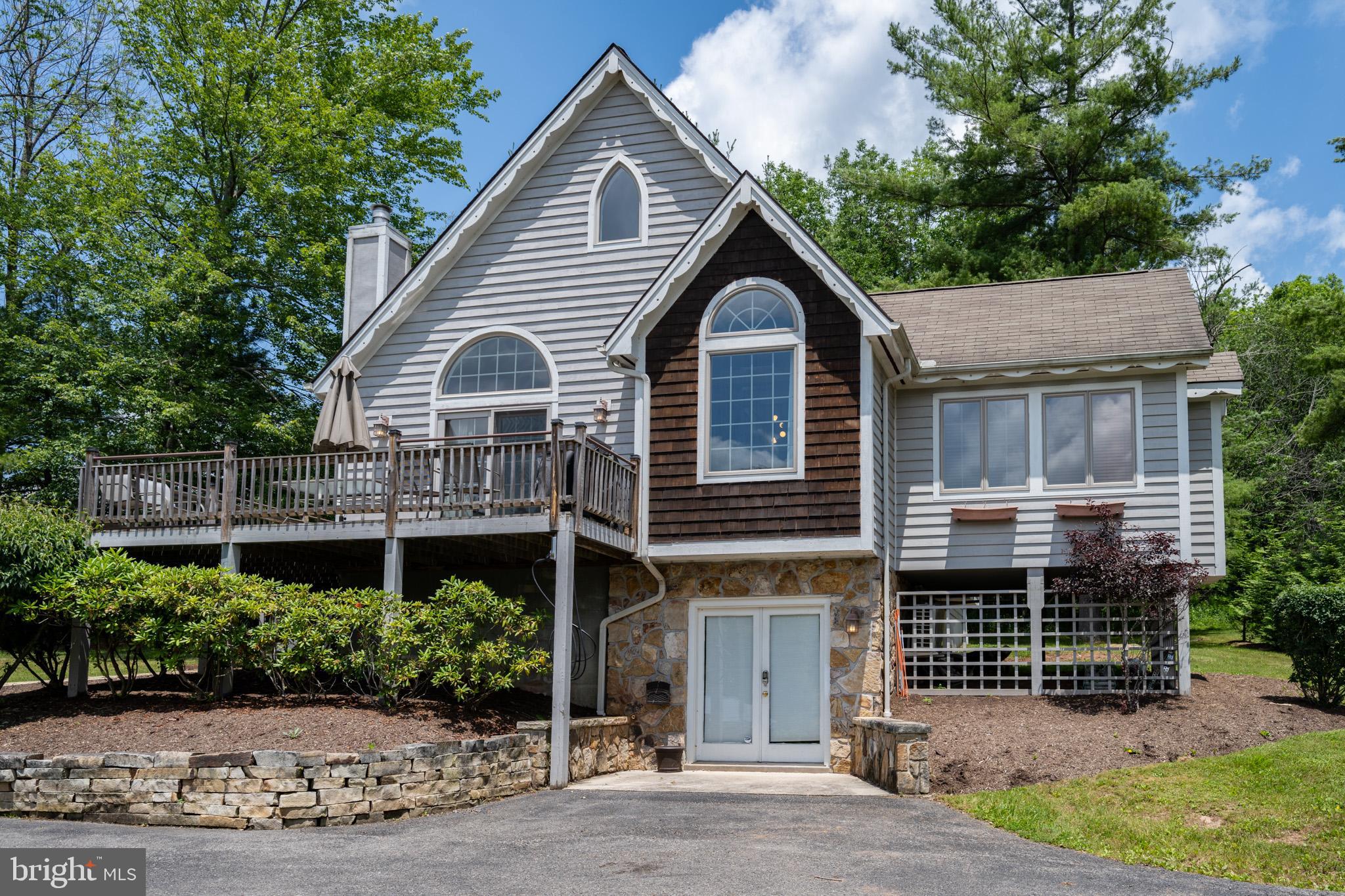 201 Rock Lodge Road McHenry, MD 21541 - Photo 1 of 75 a view of house and outdoor space with yard