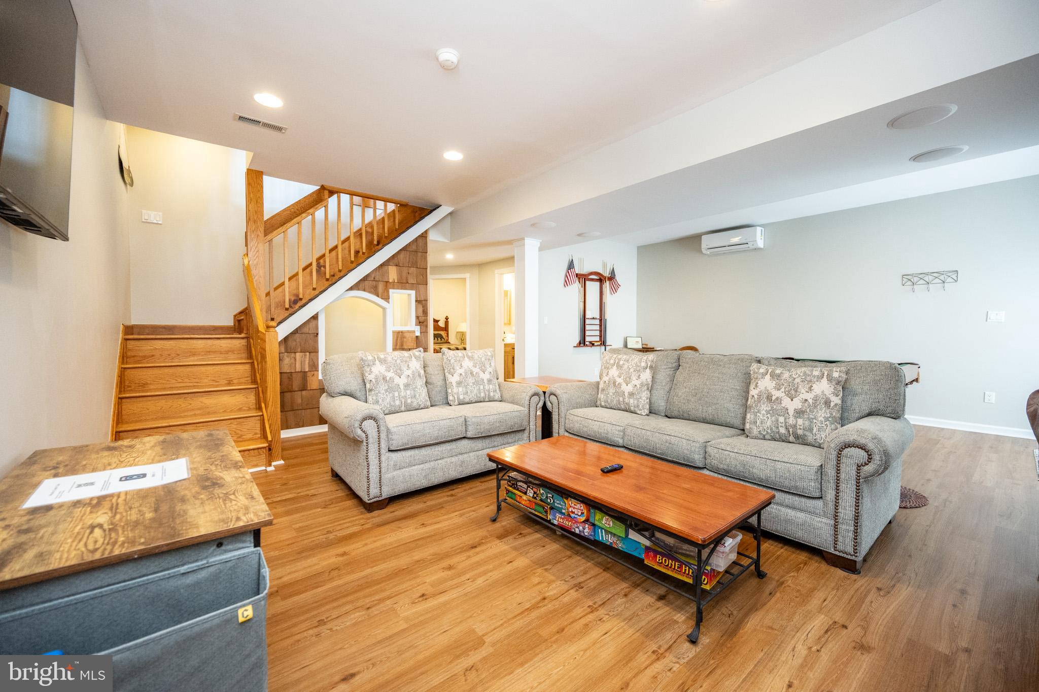 201 Rock Lodge Road McHenry, MD 21541 - Photo 43 of 75 a living room with furniture a rug and a window