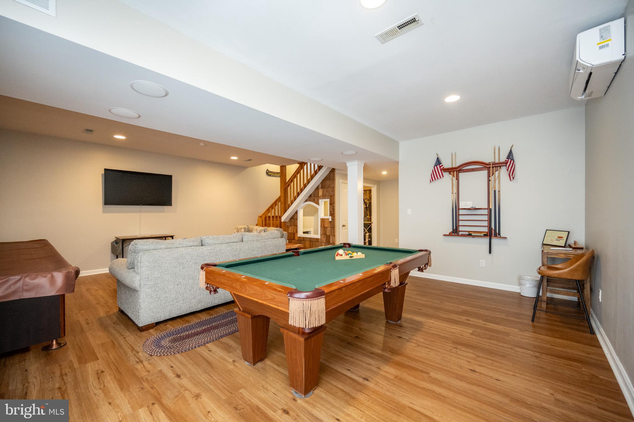 201 Rock Lodge Road McHenry, MD 21541 - Photo 46 of 75 a living room with furniture and a flat screen tv