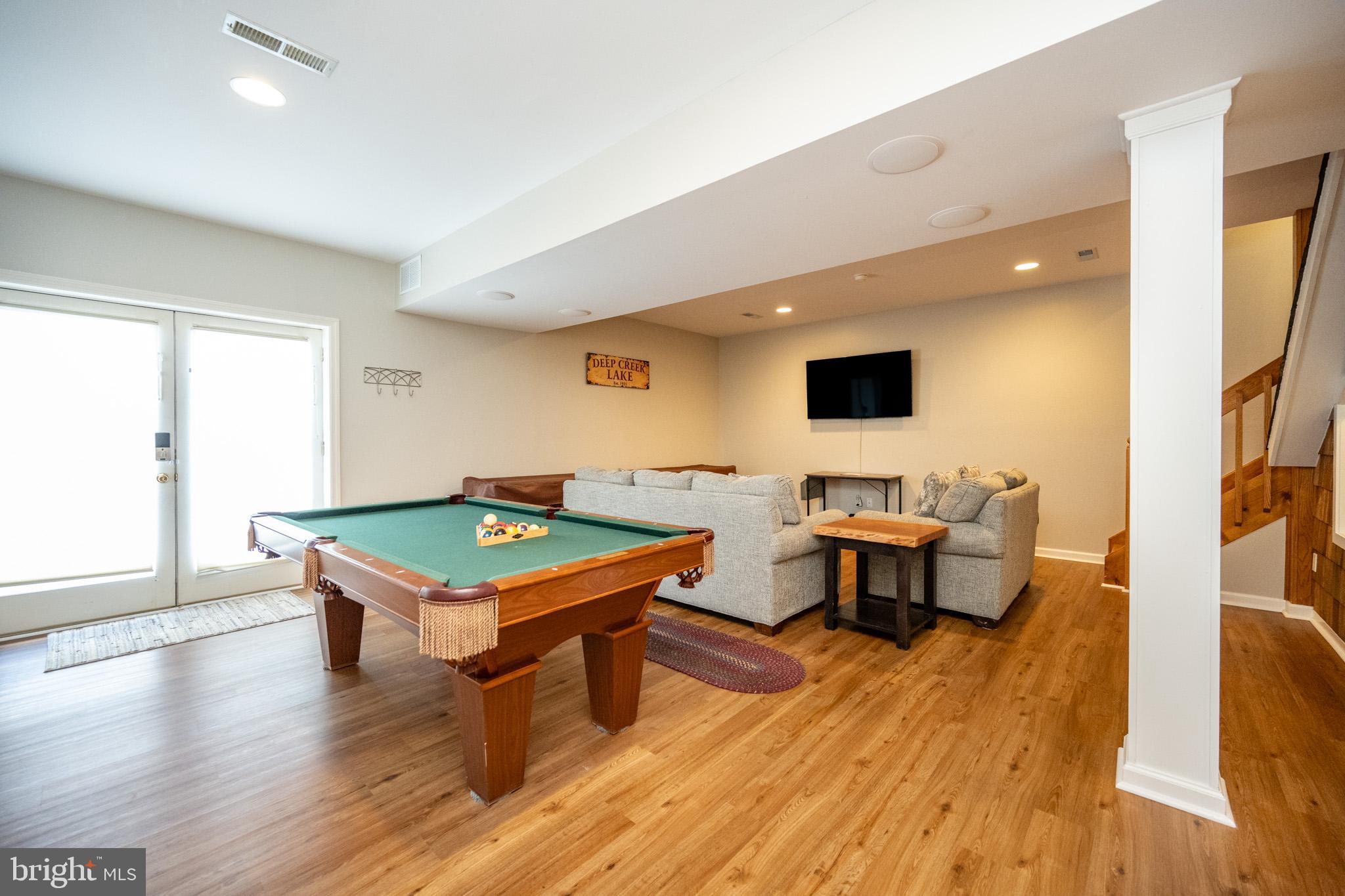 201 Rock Lodge Road McHenry, MD 21541 - Photo 47 of 75 a room with furniture pool table and a flat screen tv