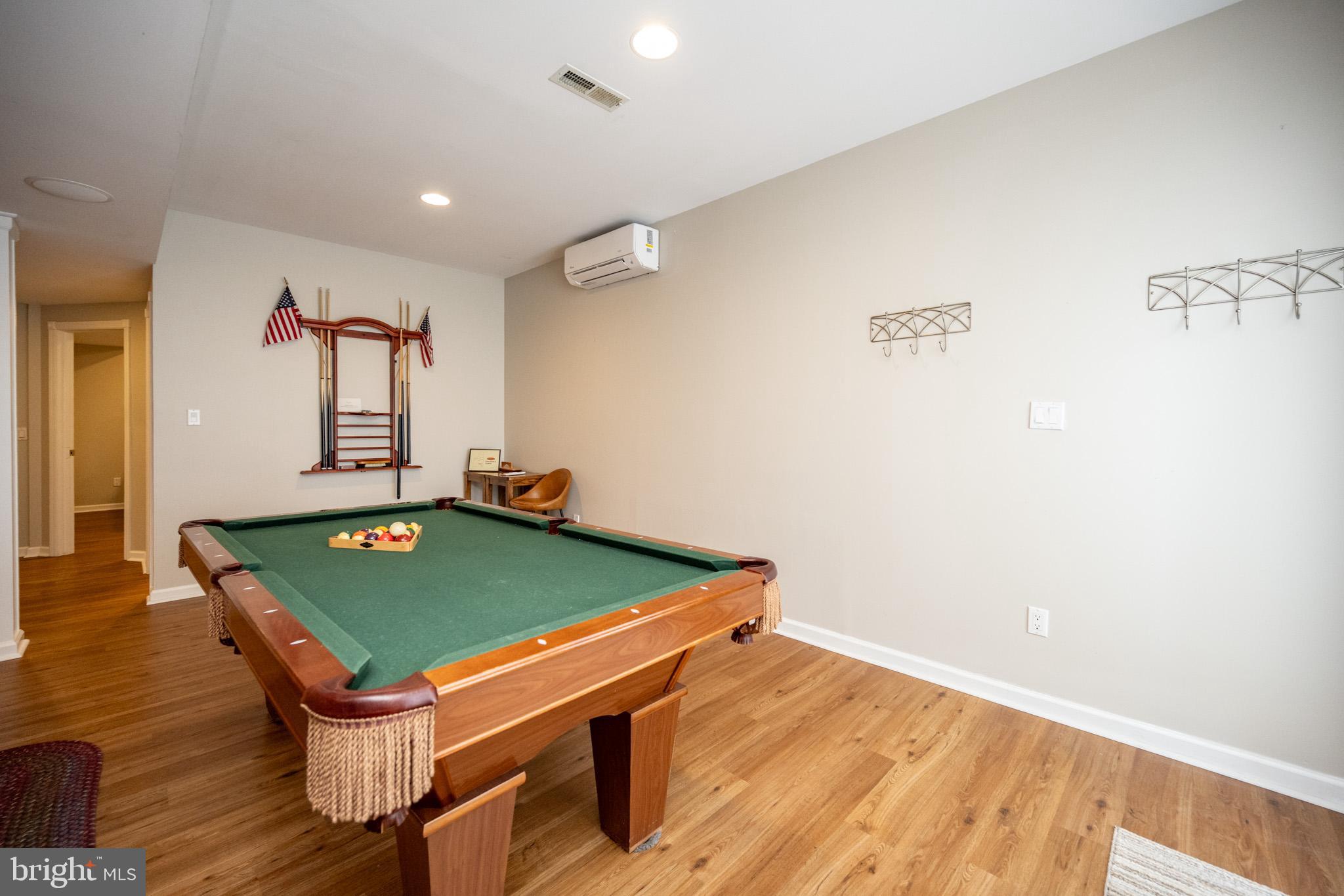 201 Rock Lodge Road McHenry, MD 21541 - Photo 49 of 75 a room with pool table and wooden floor