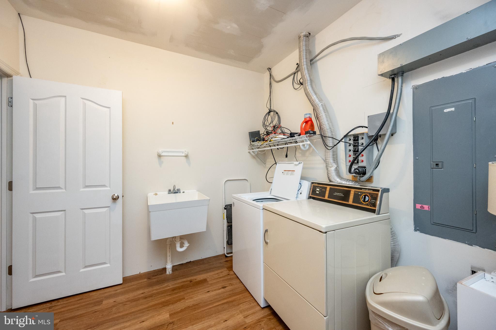 201 Rock Lodge Road McHenry, MD 21541 - Photo 54 of 75 a view of storage and utility room with washer and dryer