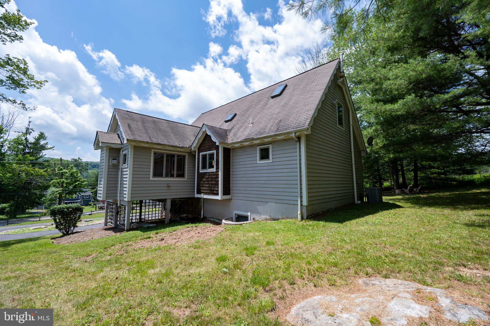 201 Rock Lodge Road McHenry, MD 21541 - Photo 60 of 75 a view of a house with a yard