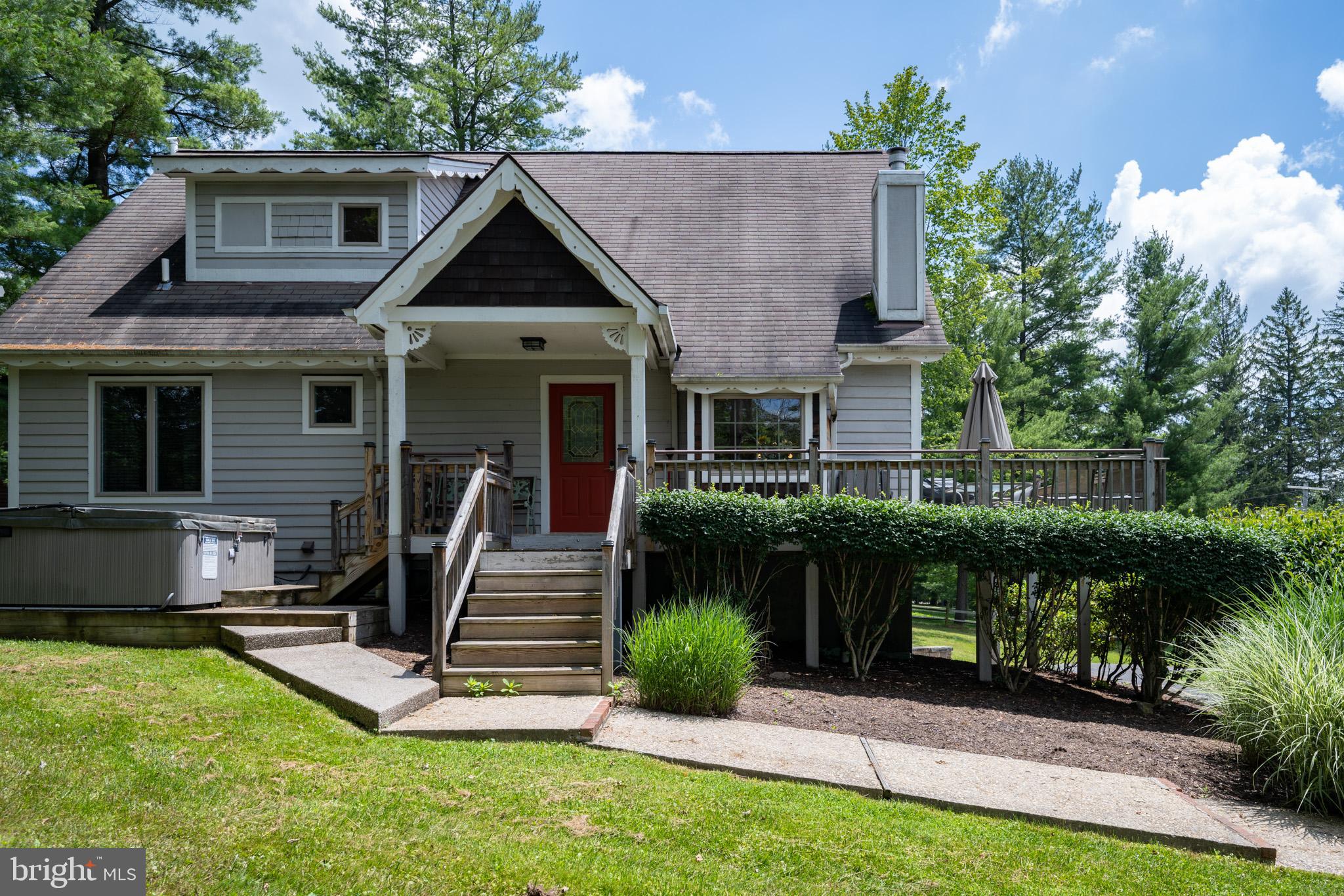 201 Rock Lodge Road McHenry, MD 21541 - Photo 6 of 75 a front view of a house with a yard