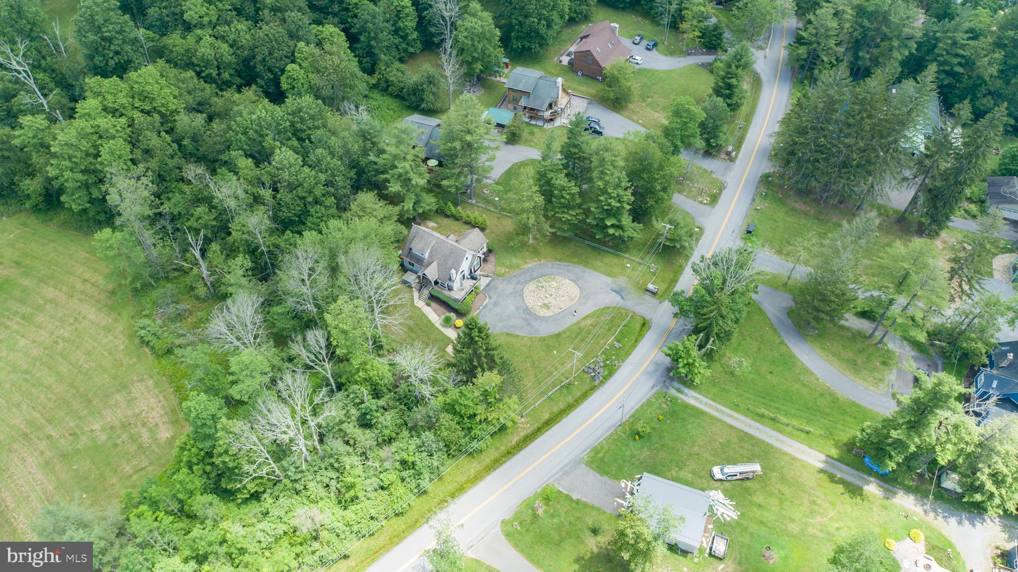 201 Rock Lodge Road McHenry, MD 21541 - Photo 71 of 75 an aerial view of a residential houses with outdoor space and trees all around