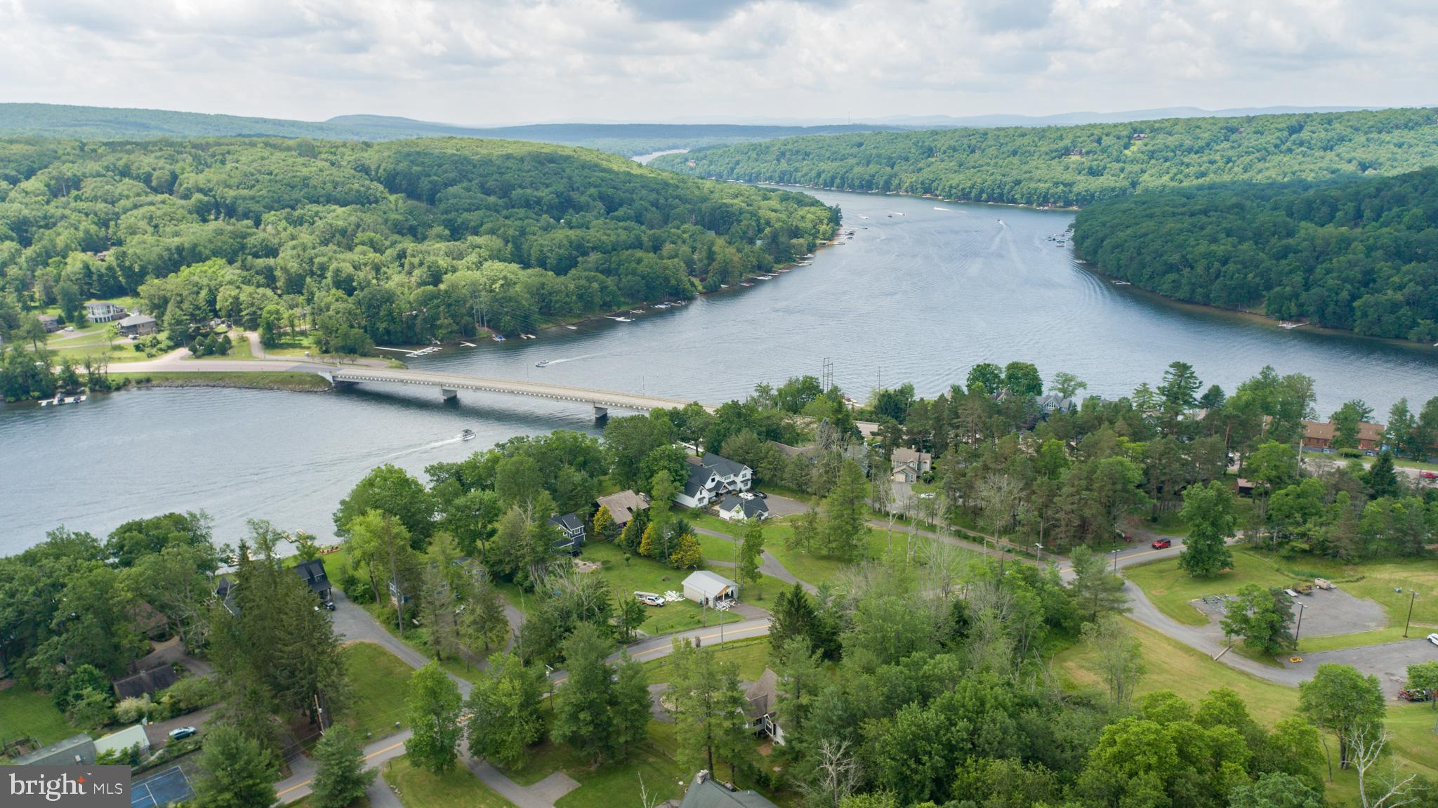 201 Rock Lodge Road McHenry, MD 21541 - Photo 72 of 75 an aerial view of a house with a yard and lake view