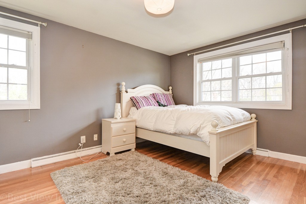 59 Amor Road Milton, MA 02186 - Photo 20 of 29 a bedroom with a bed and a window