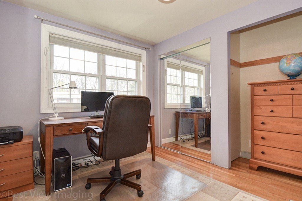 59 Amor Road Milton, MA 02186 - Photo 21 of 29 a view of a workspace with furniture and a window