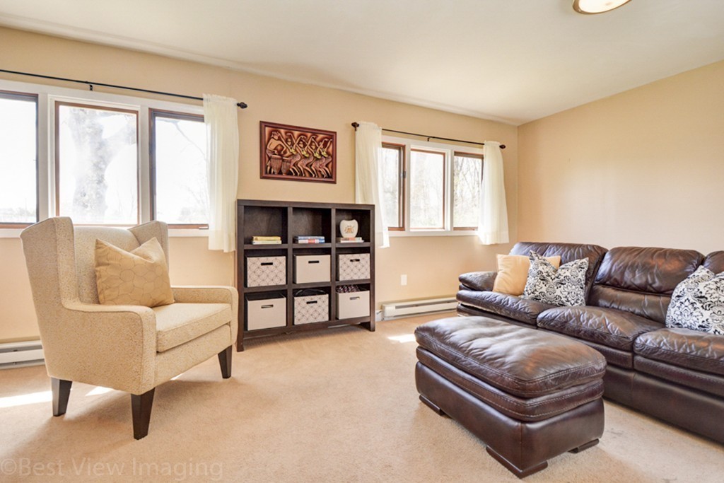 59 Amor Road Milton, MA 02186 - Photo 24 of 29 a living room with furniture and a large window