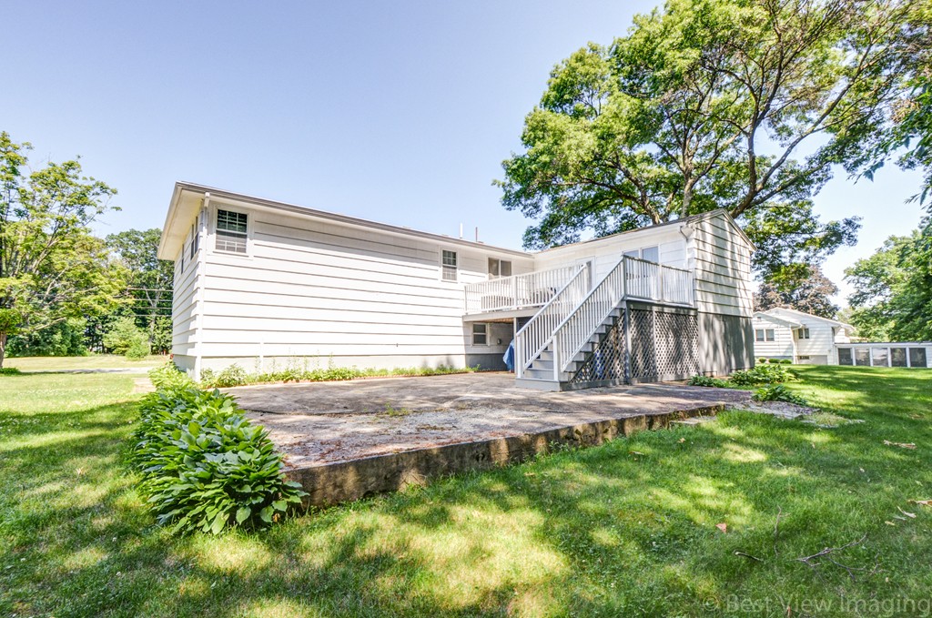 59 Amor Road Milton, MA 02186 - Photo 29 of 29 a house view with a garden space