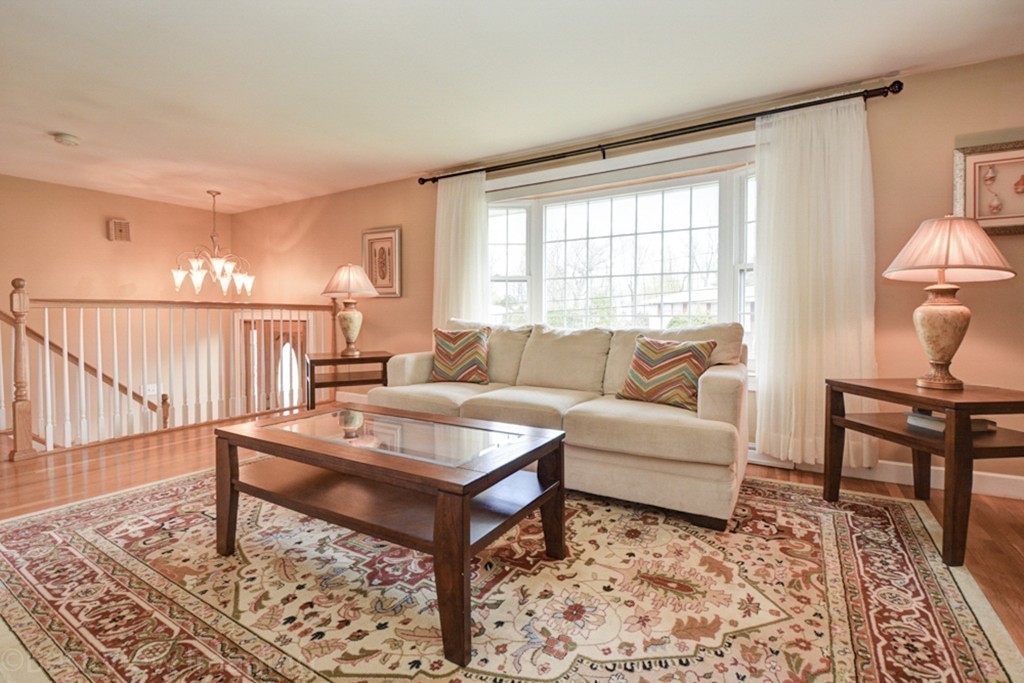 59 Amor Road Milton, MA 02186 - Photo 4 of 29 a living room with furniture and a window