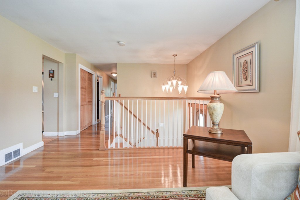 59 Amor Road Milton, MA 02186 - Photo 5 of 29 a view of entryway and hall with wooden floor