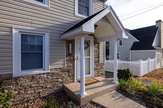 a view of backyard with green space