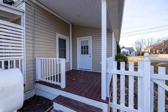 a view of a porch with furniture