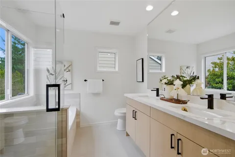 a bathroom with sink and mirror