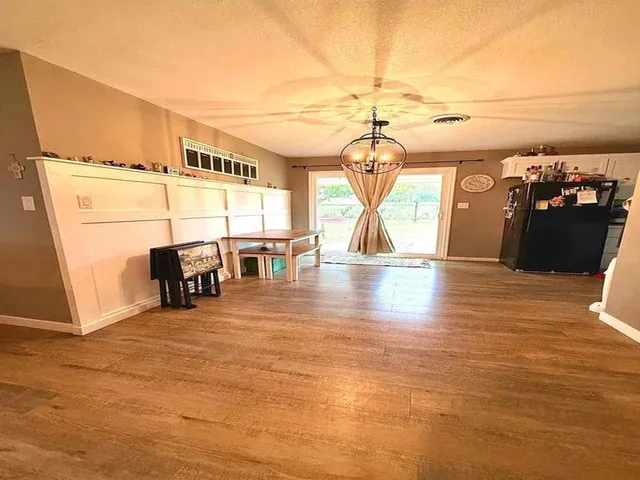 a view of a living room and a garage