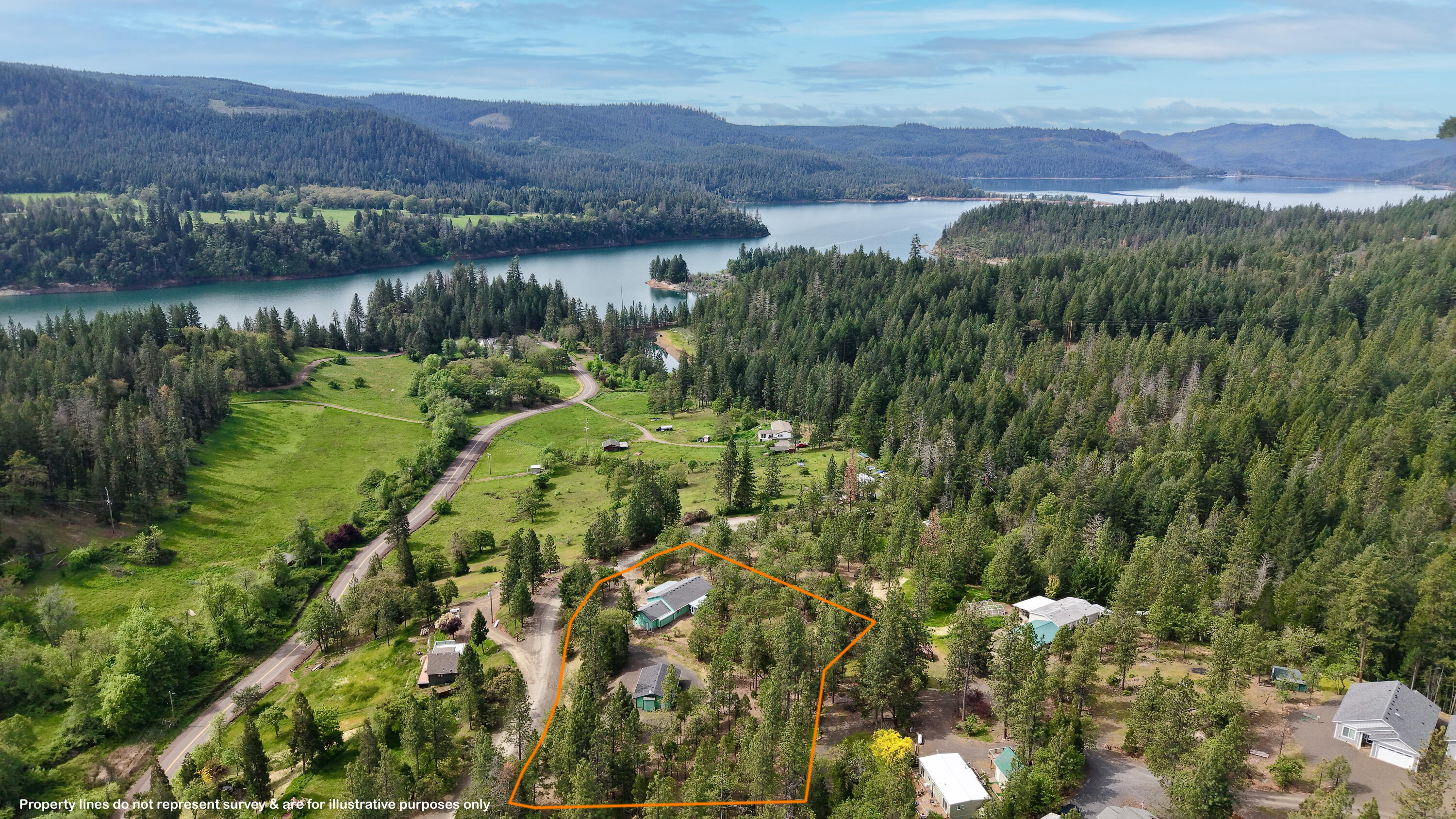204 Shipley Terrace Prospect, OR 97536 - Photo 50 of 61 a view of a lush green hillside and houses