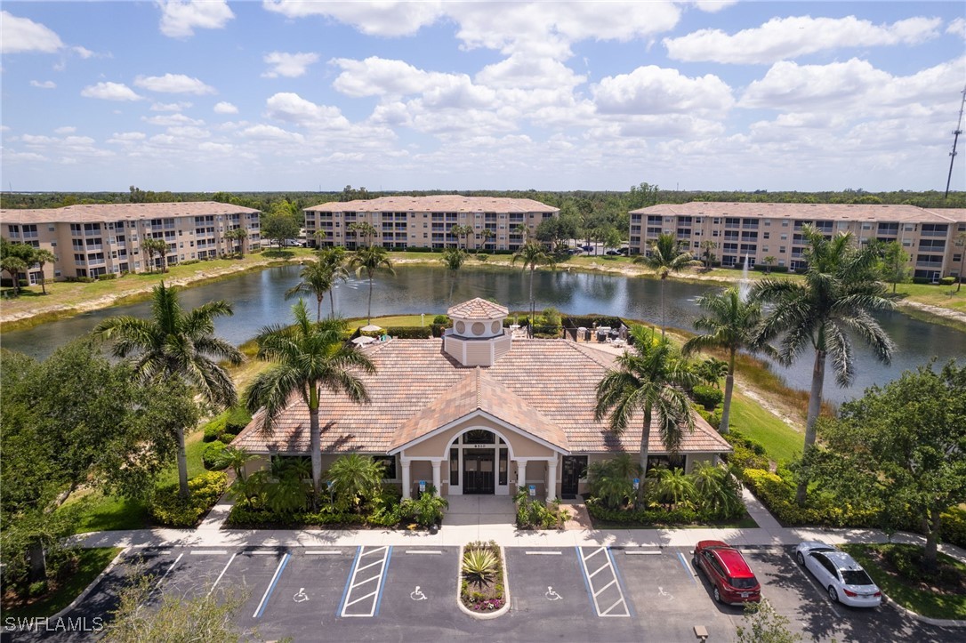 8550 Kingbird Loop, Unit 637 Estero, FL 33967 - Photo 27 of 35 an aerial view of houses with yard