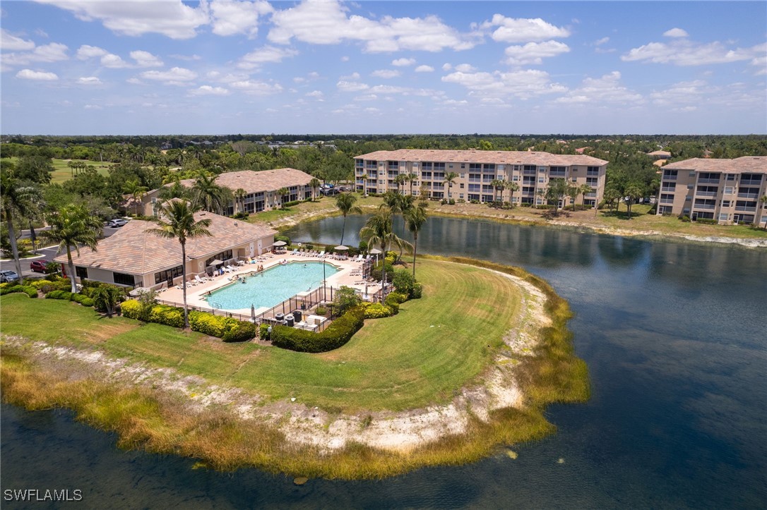 8550 Kingbird Loop, Unit 637 Estero, FL 33967 - Photo 29 of 35 a view of a lake with a city