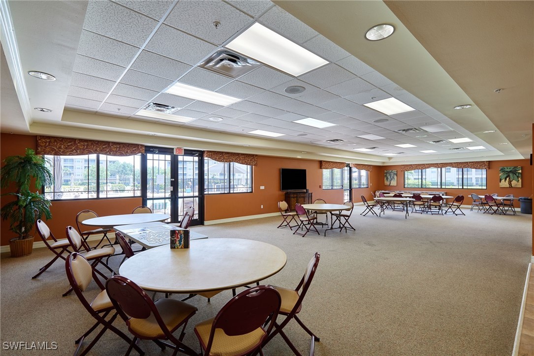 8550 Kingbird Loop, Unit 637 Estero, FL 33967 - Photo 35 of 35 a view of a dining room with furniture window and outside view
