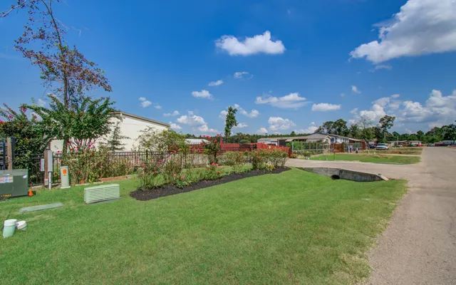 a view of a deck with a big yard