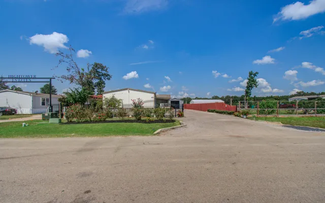 a view of a garden with a yard