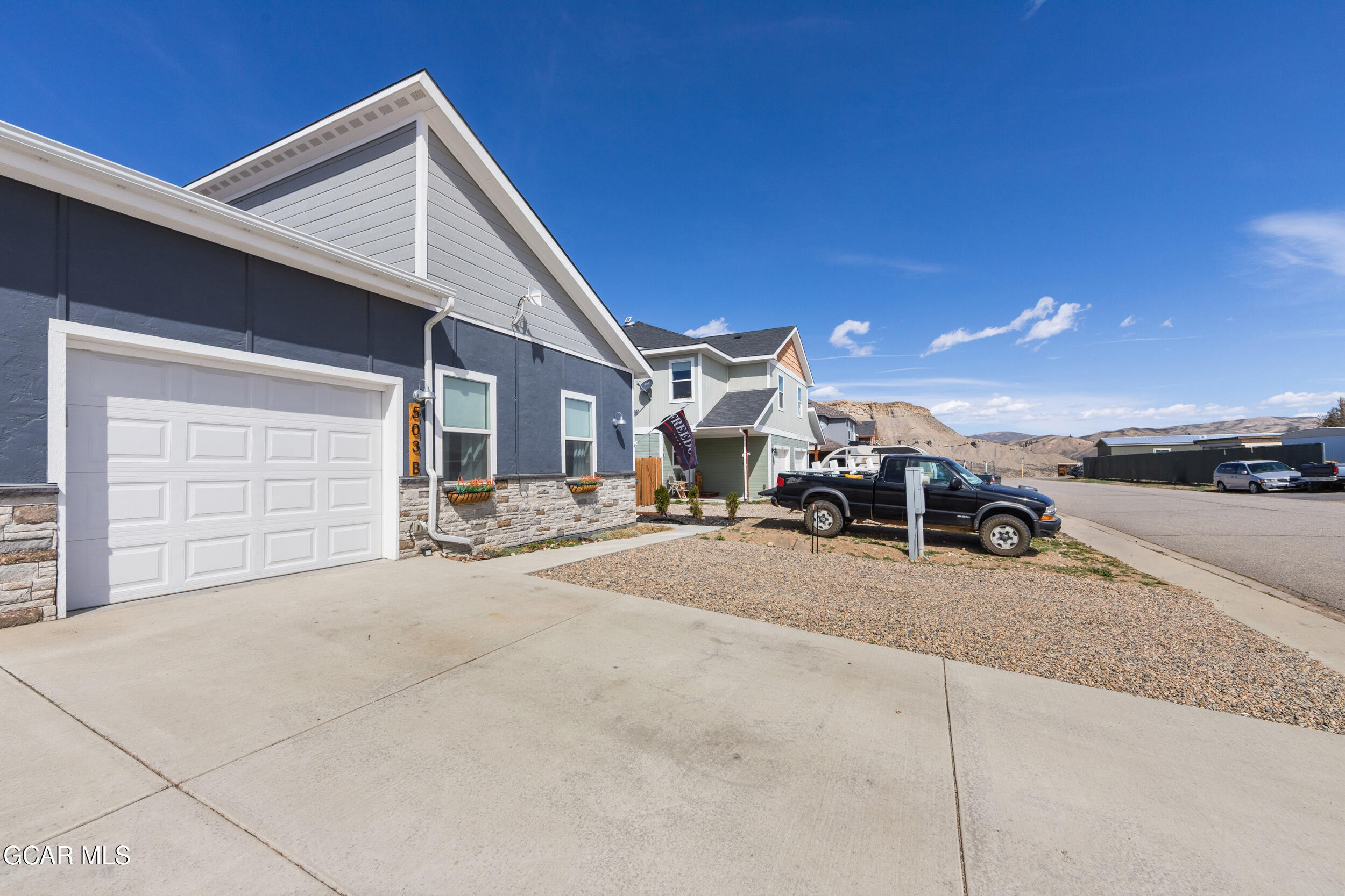 503 12th Street, Unit B Kremmling, CO 80459 - Photo 43 of 44 a view of a house with a patio