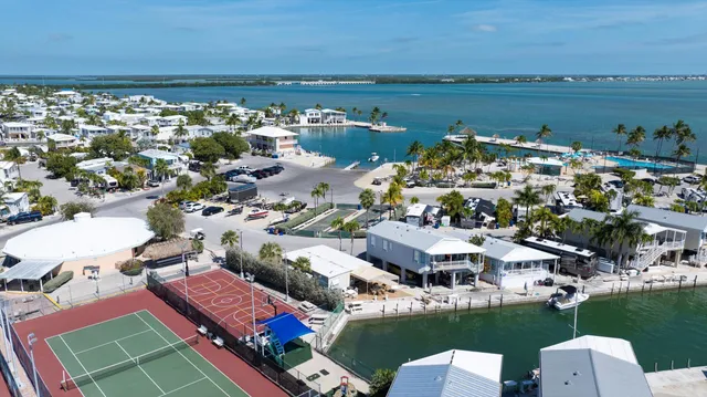 a view of a city with an ocean view