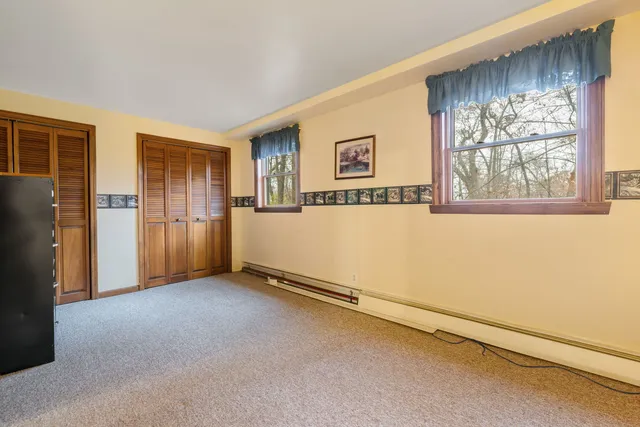 an empty room with windows