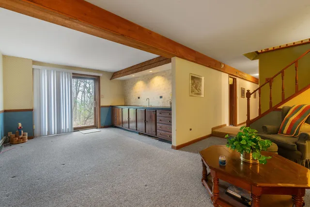 a view of an entryway with a livingroom