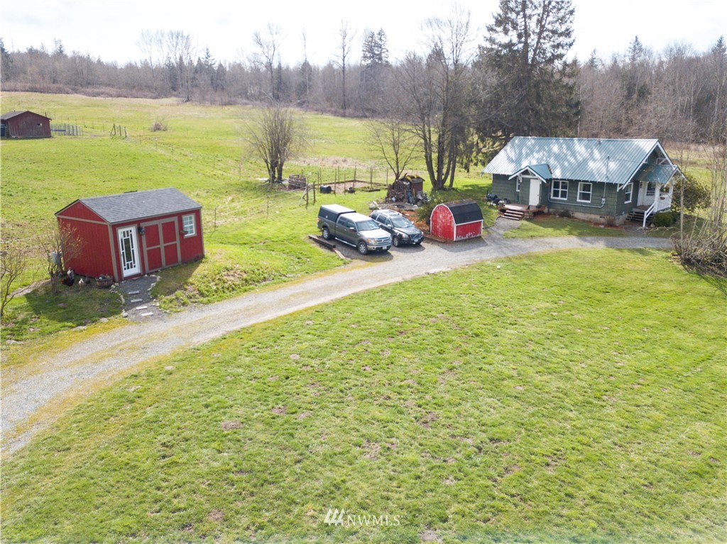 5574 E Road Bellingham, WA 98226 - Photo 23 of 25 a view of a lake with houses