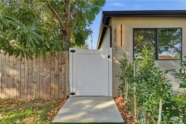 a view of backyard with small cabin