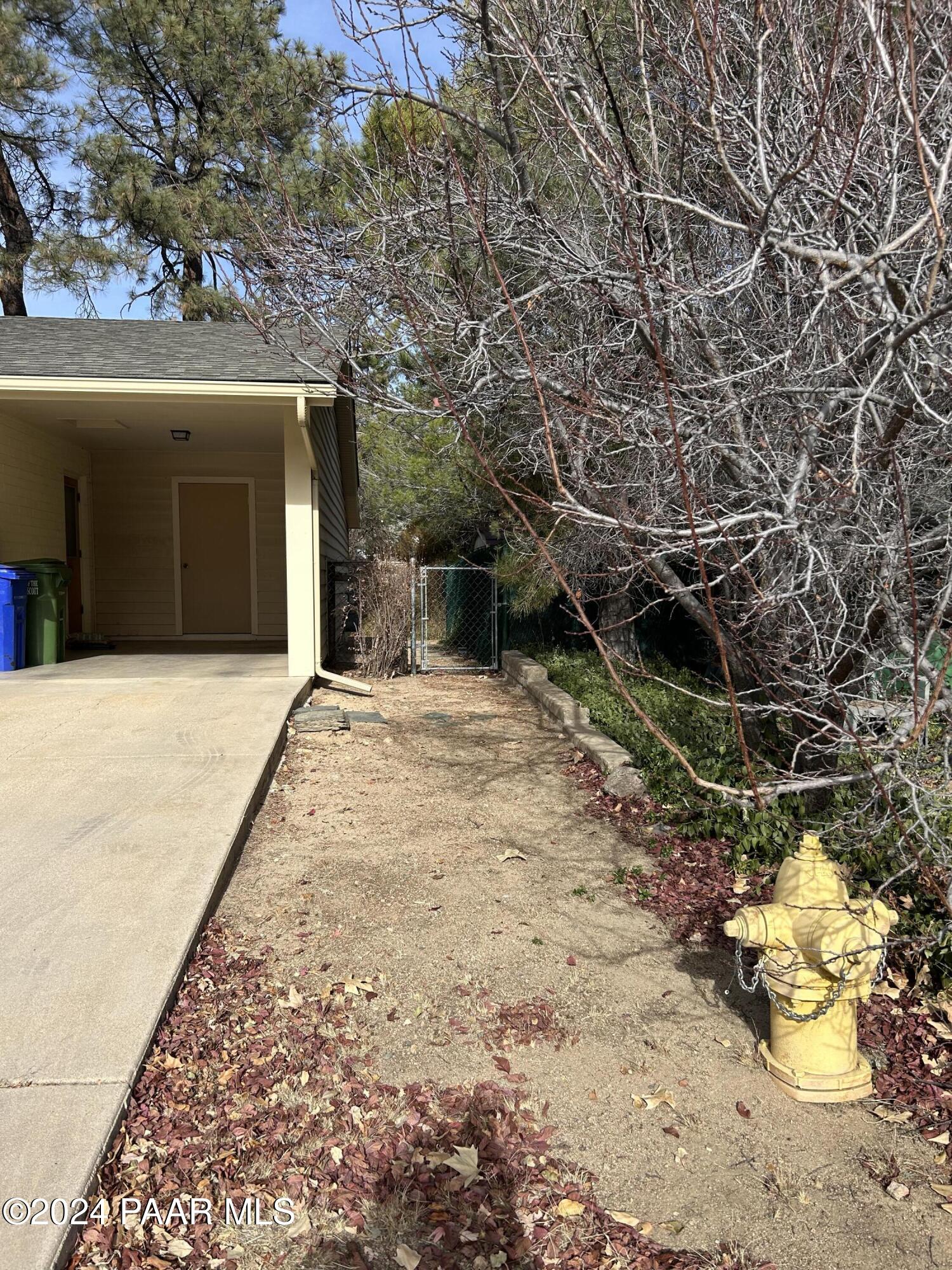 1716 Meadowbrook Road Prescott, AZ 86303 - Photo 9 of 20 right side of home close proximity to fi