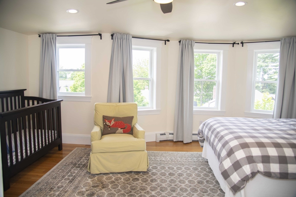 3 Chester Road, Unit 3 Belmont, MA 02478 - Photo 22 of 40 a bedroom with a bed and window