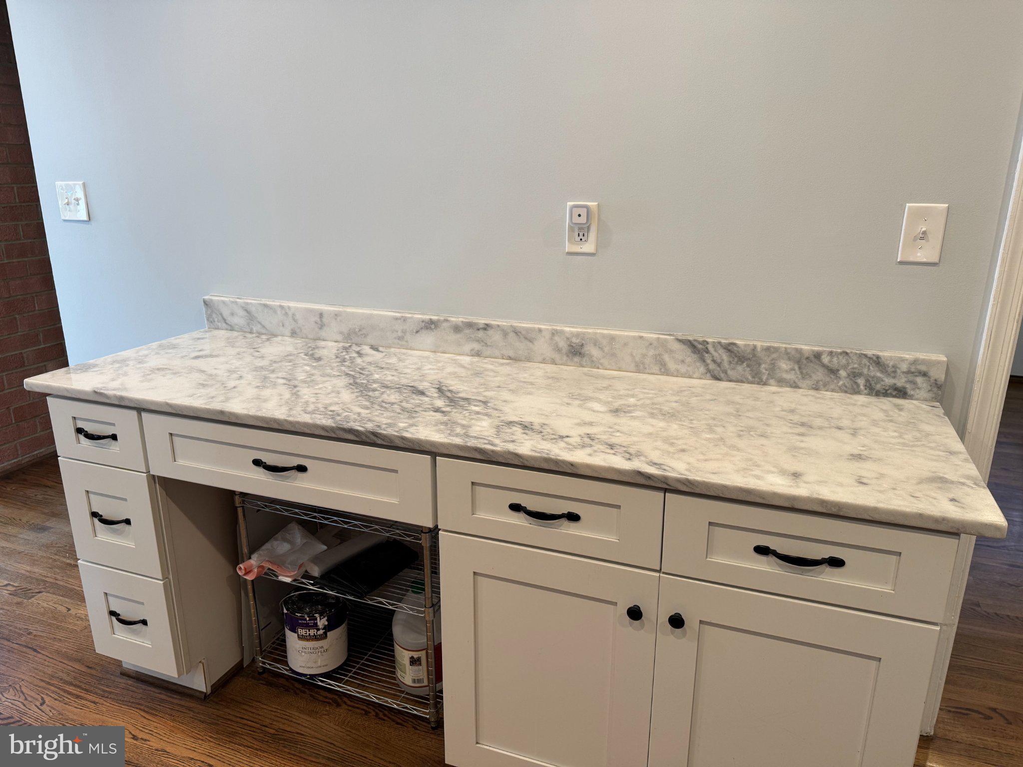 6603 Huntsman Boulevard Springfield, VA 22152 - Photo 13 of 64 Elegant marble countertop with cabinetry.