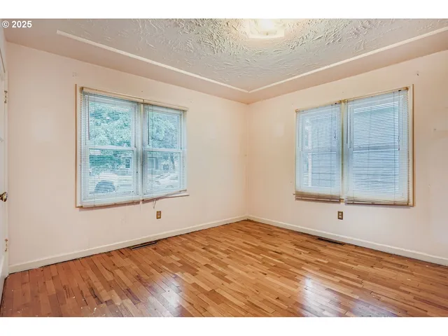 a view of an empty room with window