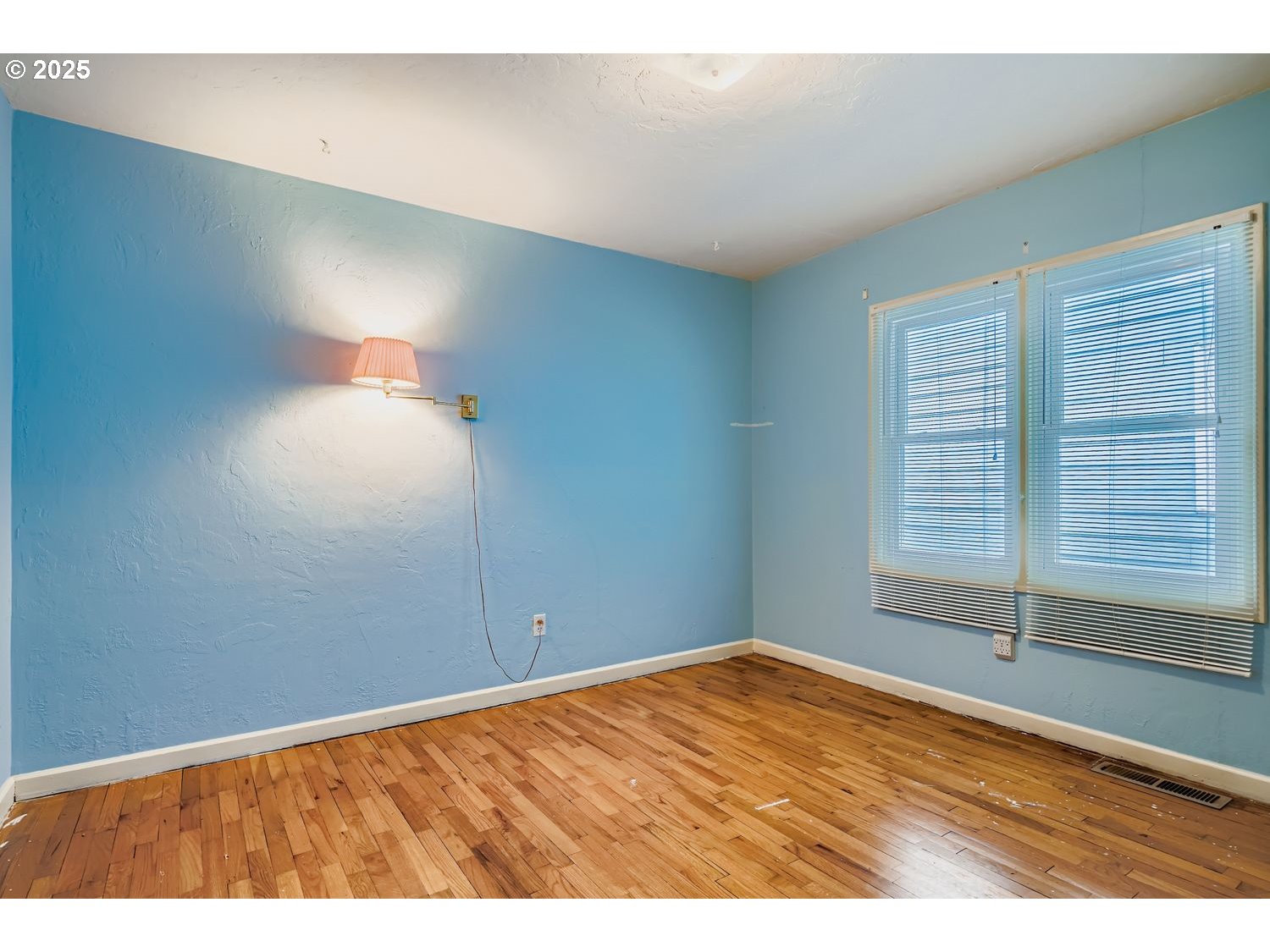 1515 Norway Street Northeast Salem, OR 97301 - Photo 19 of 27 a view of empty room with wooden floor