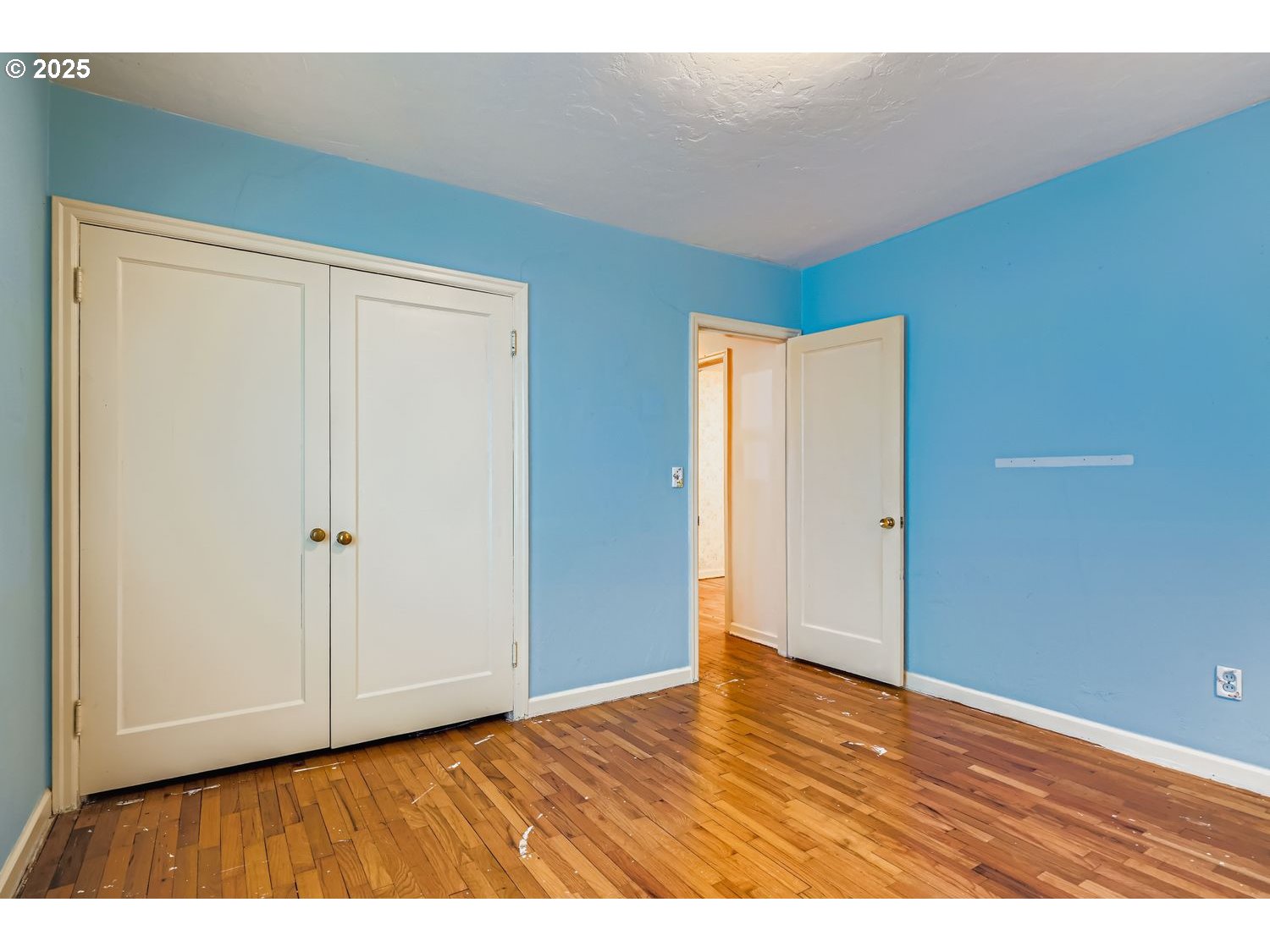 1515 Norway Street Northeast Salem, OR 97301 - Photo 20 of 27 a view of an empty room and wooden floor