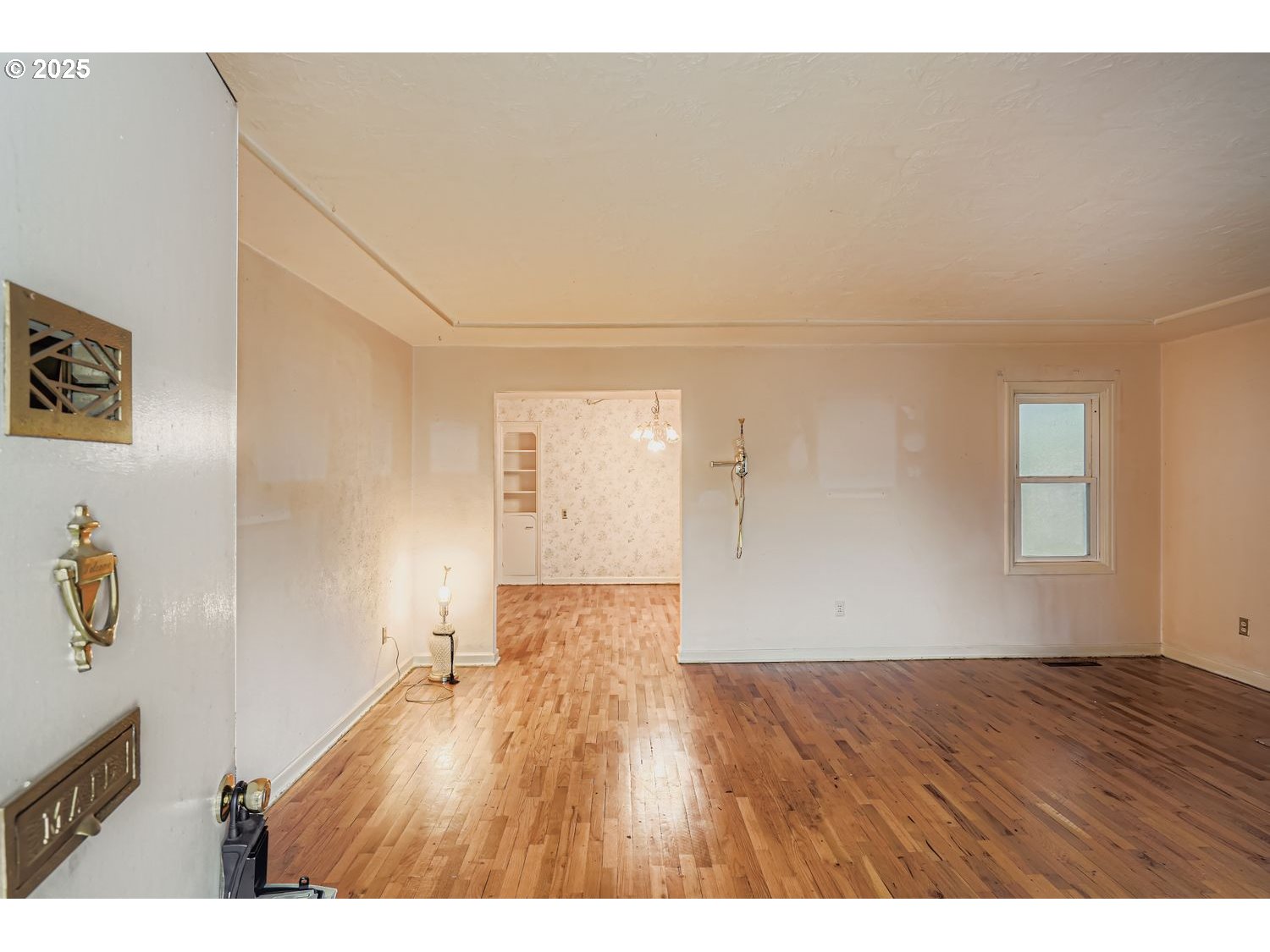 1515 Norway Street Northeast Salem, OR 97301 - Photo 3 of 27 a view of an empty room with wooden floor