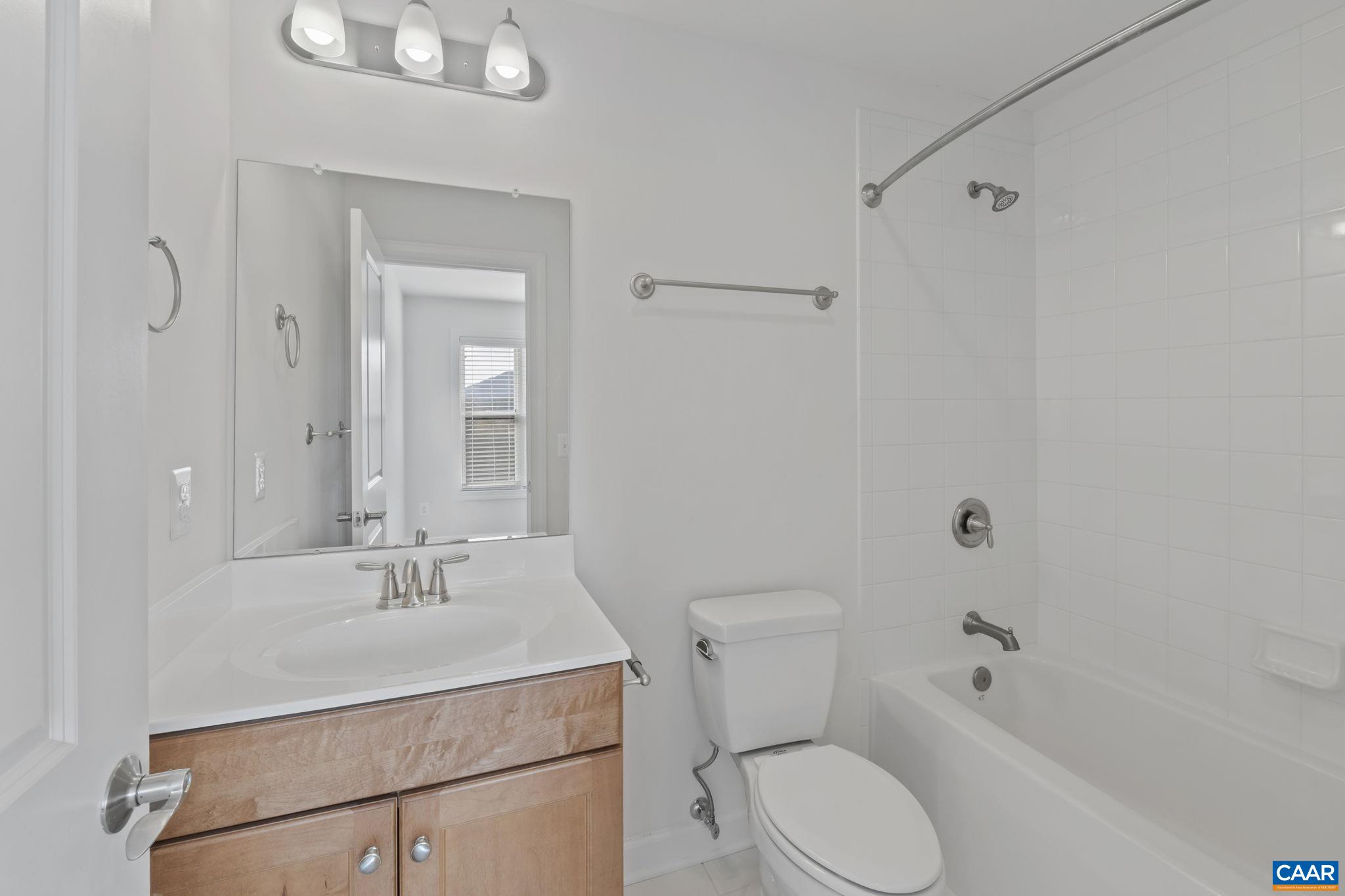1429 Midland Street Charlottesville, VA 22902 - Photo 20 of 33 a bathroom with a sink toilet and shower