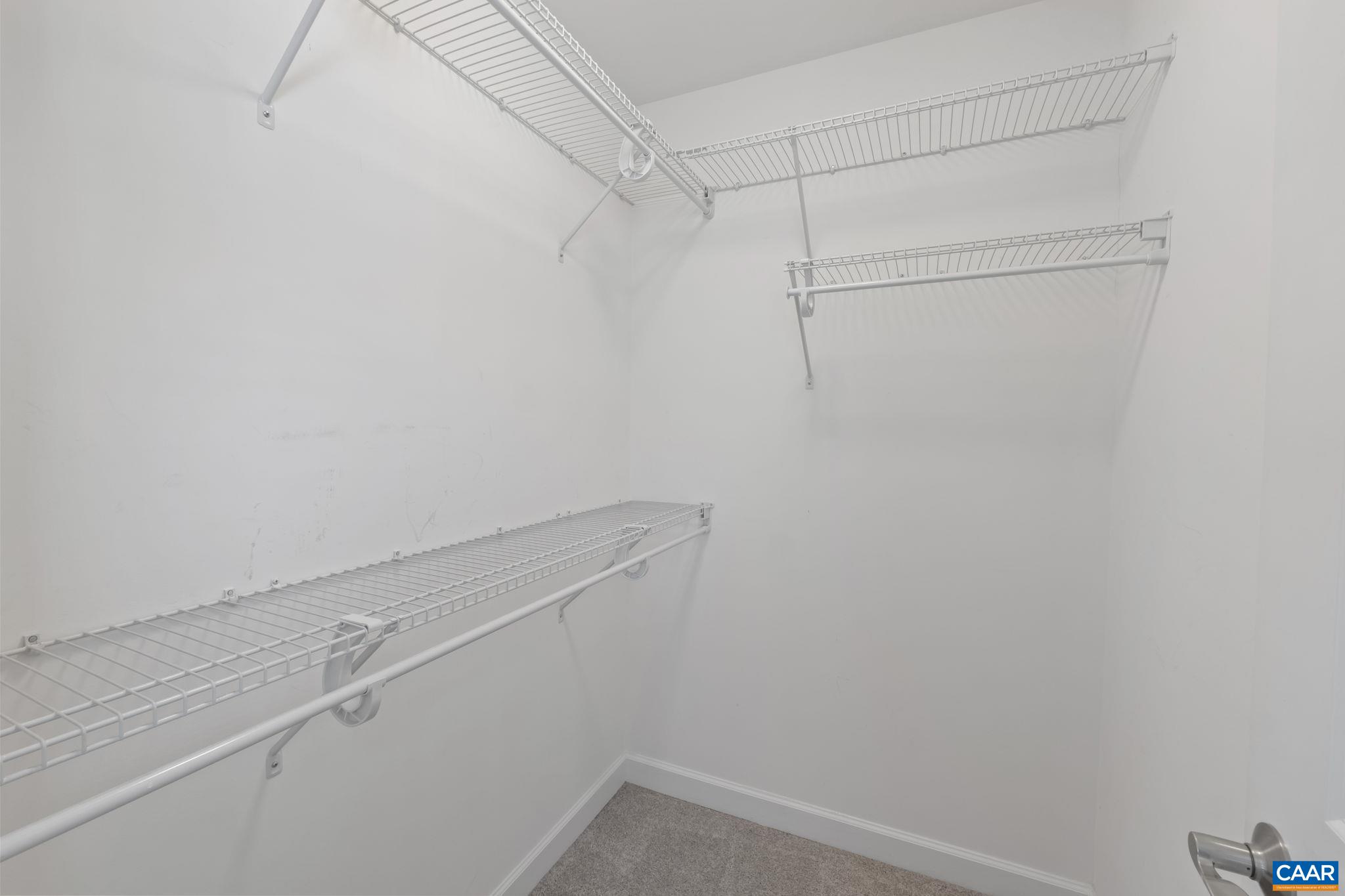 1429 Midland Street Charlottesville, VA 22902 - Photo 24 of 33 a view of a room with racks on the wall