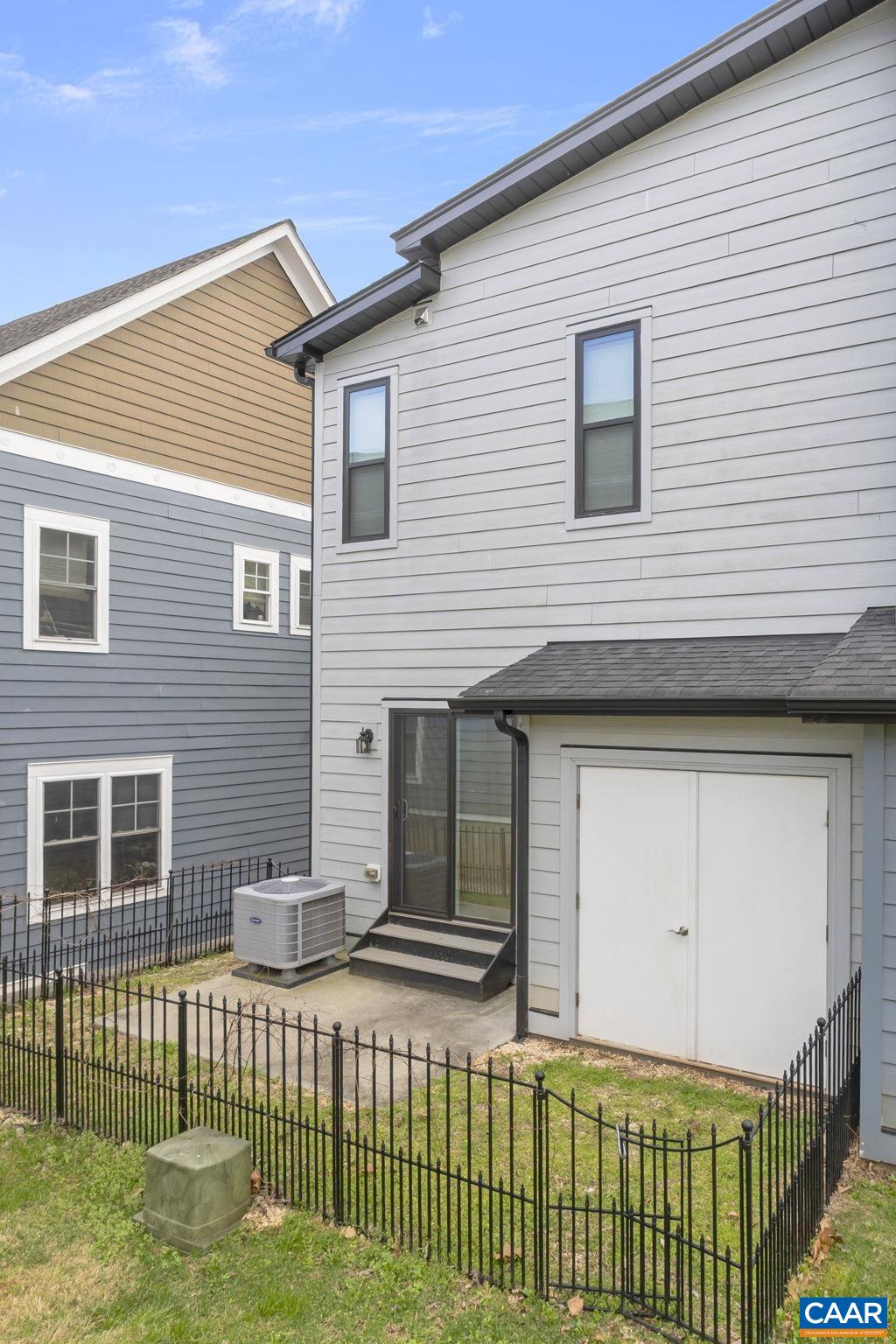 1429 Midland Street Charlottesville, VA 22902 - Photo 32 of 33 a front view of a house with a garden