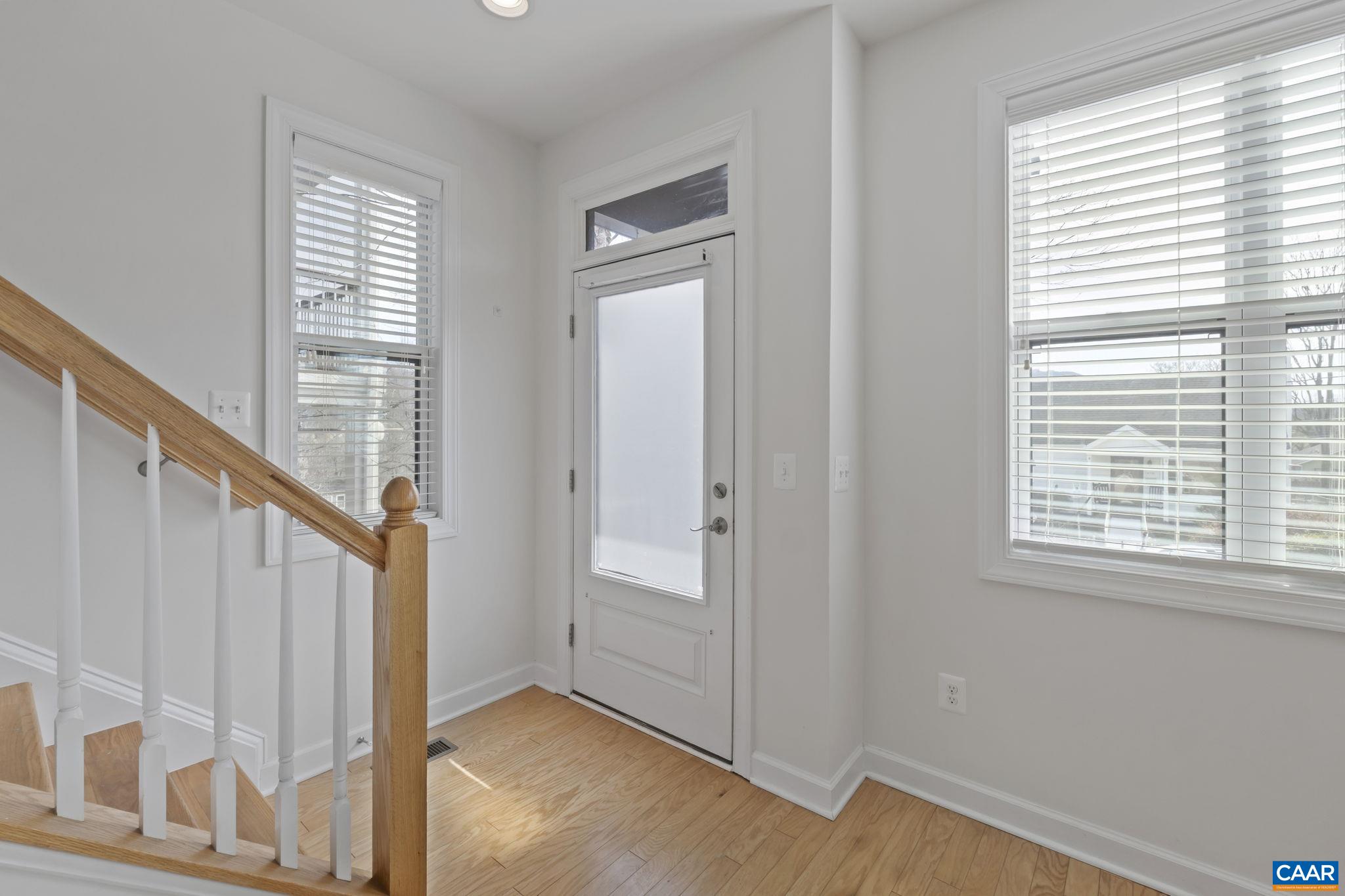 1429 Midland Street Charlottesville, VA 22902 - Photo 5 of 33 a view of an entryway with wooden floor