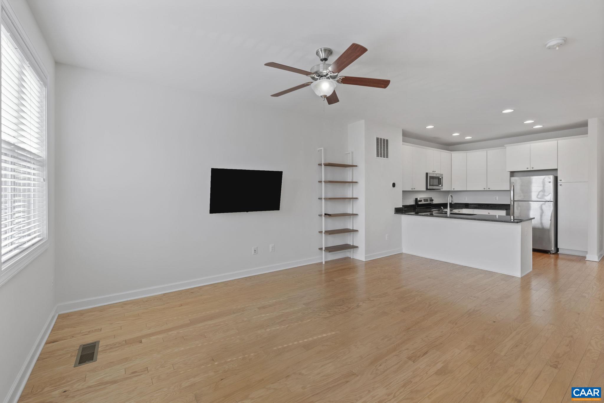 1429 Midland Street Charlottesville, VA 22902 - Photo 6 of 33 a view of kitchen with wooden floor and window