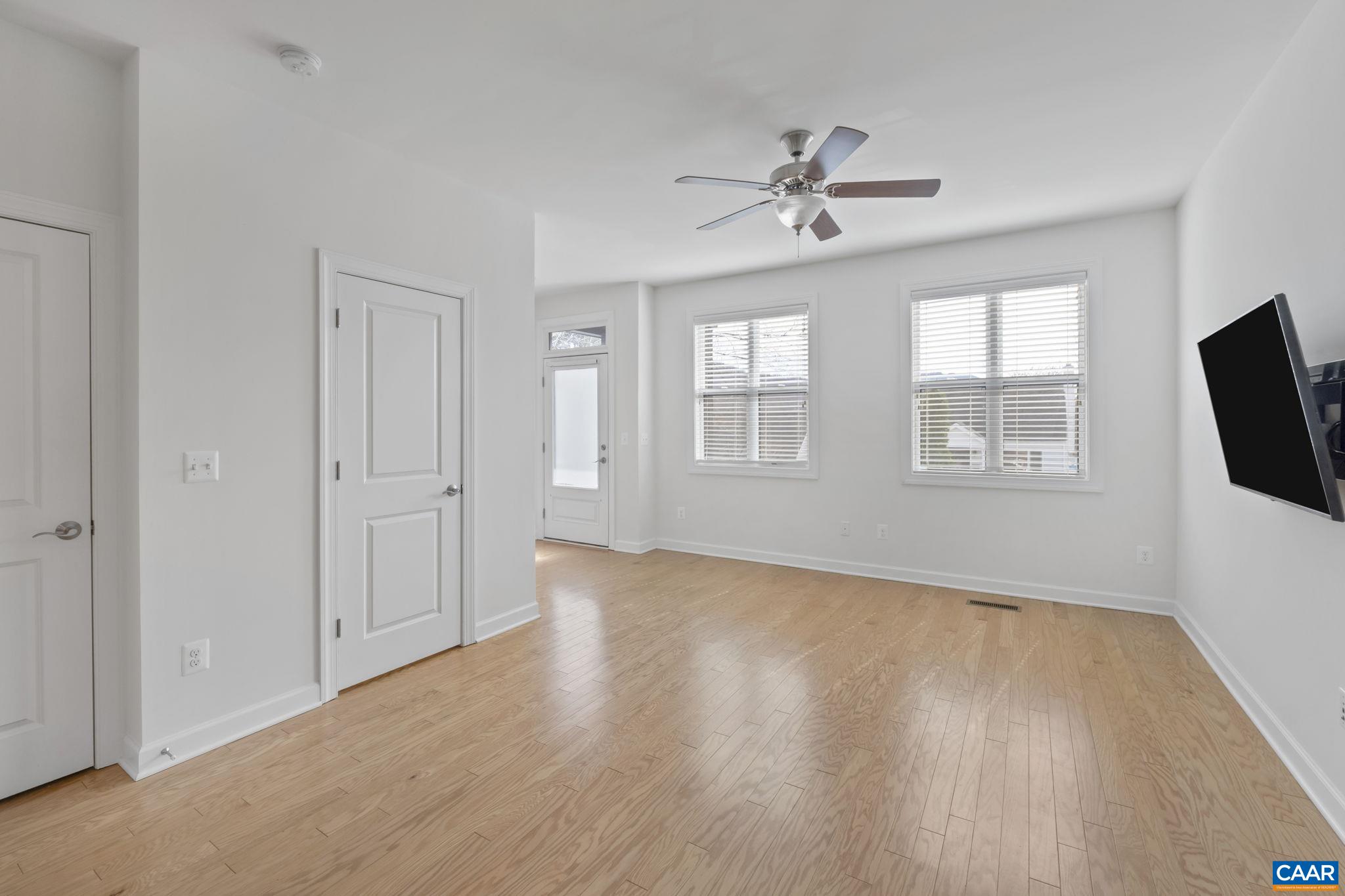 1429 Midland Street Charlottesville, VA 22902 - Photo 8 of 33 wooden floor in an empty room with a window